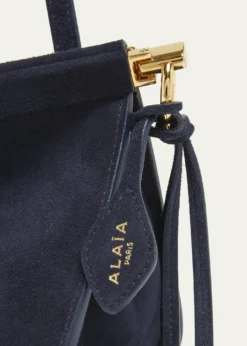 ALAIALe Click East-West Suede Shoulder Bag