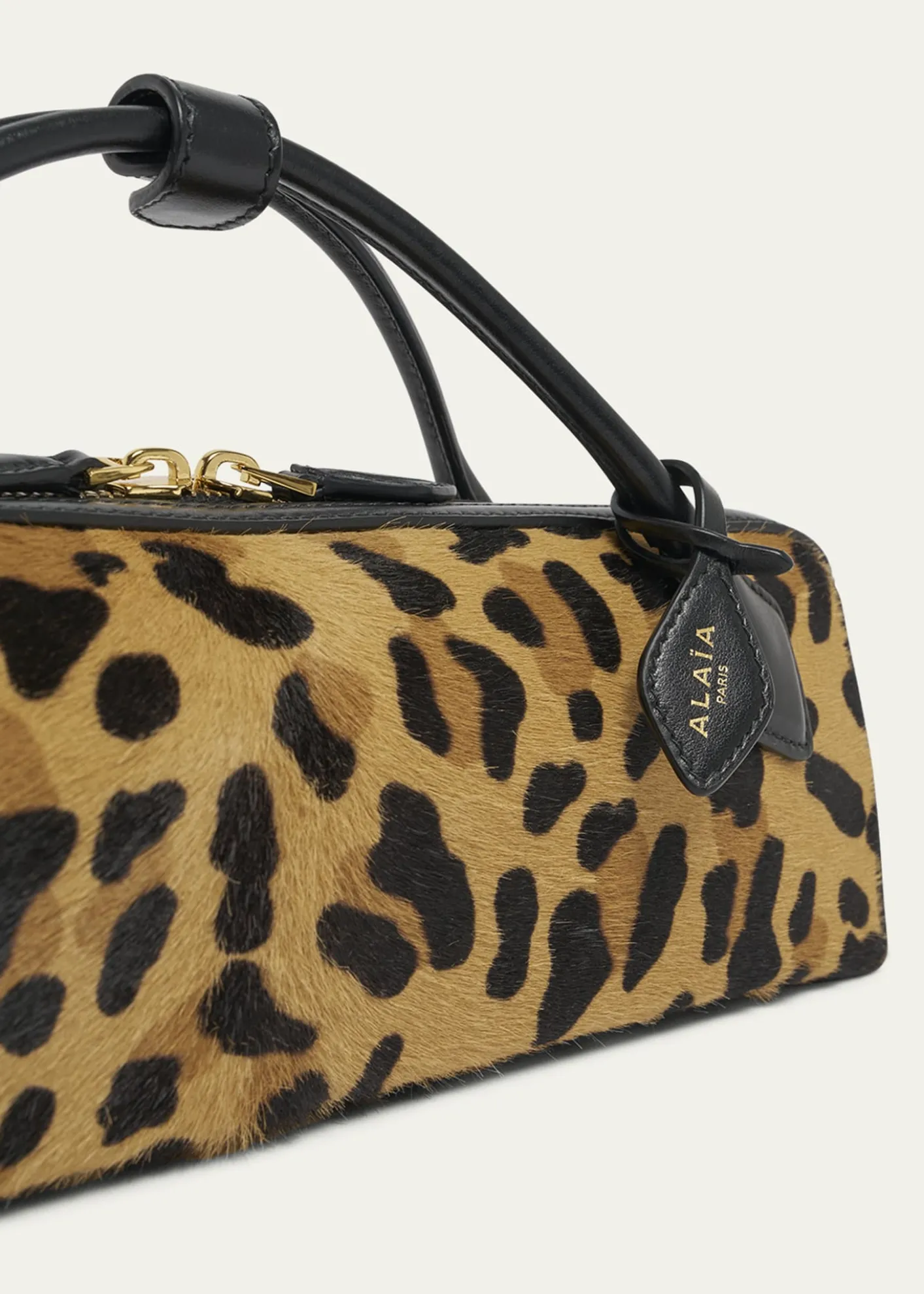 ALAIALe Teckel Clutch Bag in Leopard Calf Hair