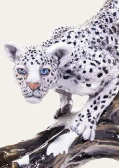 Jay StrongwaterSnow Leopard Descending Branch Tabletop Object