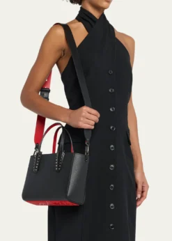THIS ITEM IS NOT AVAILABLE.Christian LouboutinCabata Mini Tote Bag in Leather with Spikes