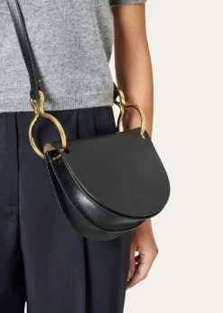 THIS ITEM IS NOT AVAILABLE.Il BisonteConsuelo Ring Flap Leather Crossbody Bag