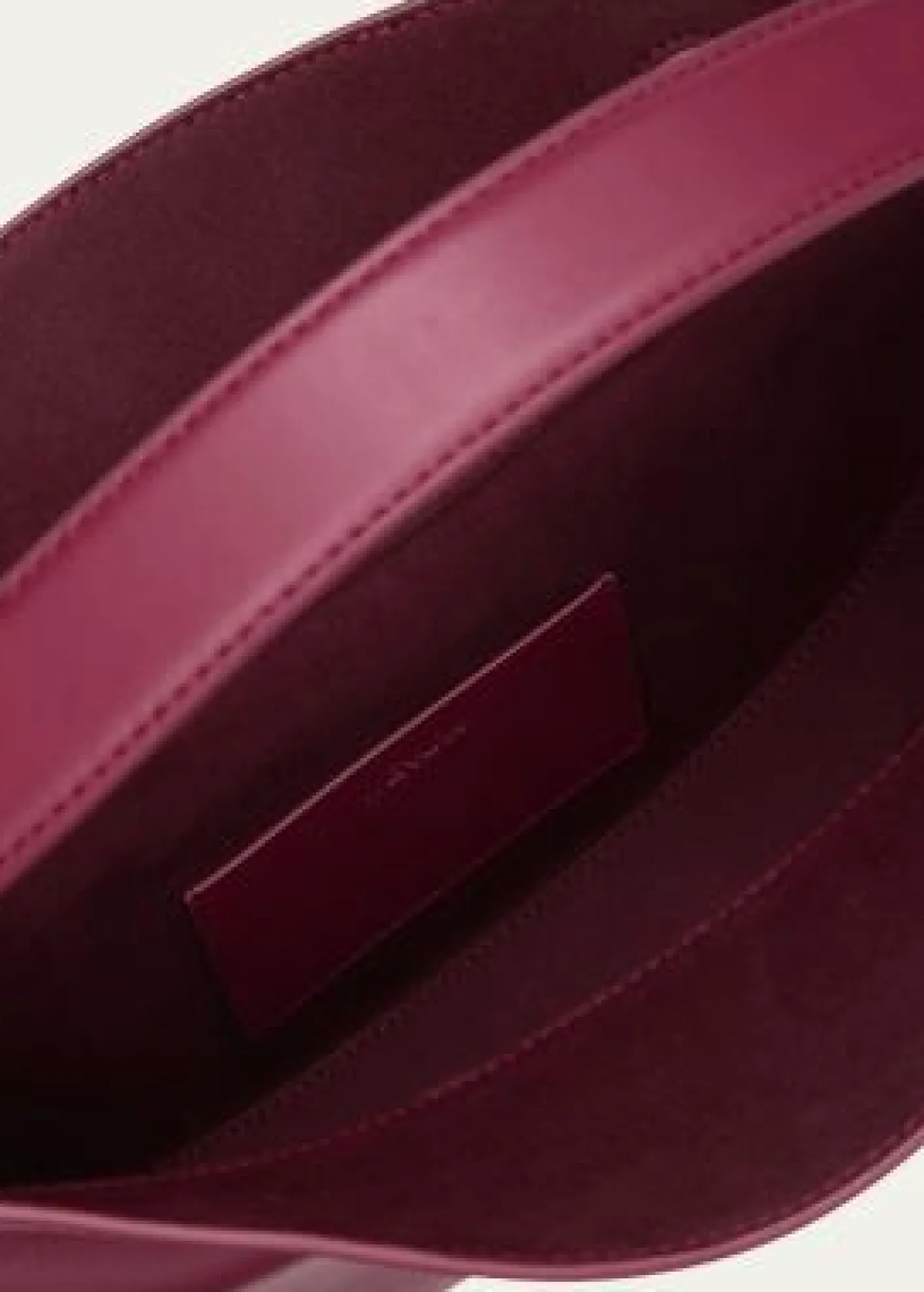WE-AR4The Eclipse Polished Leather Crossbody Bag