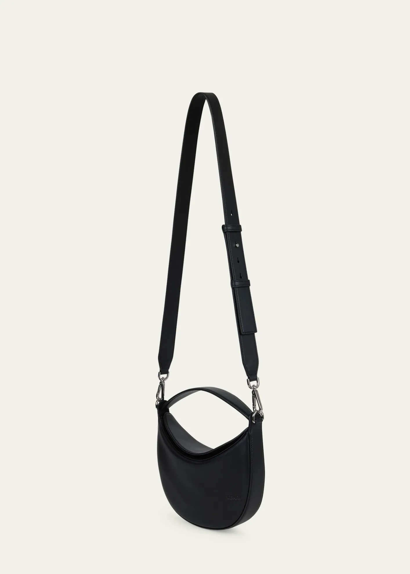 WE-AR4The Eclipse Polished Leather Crossbody Bag